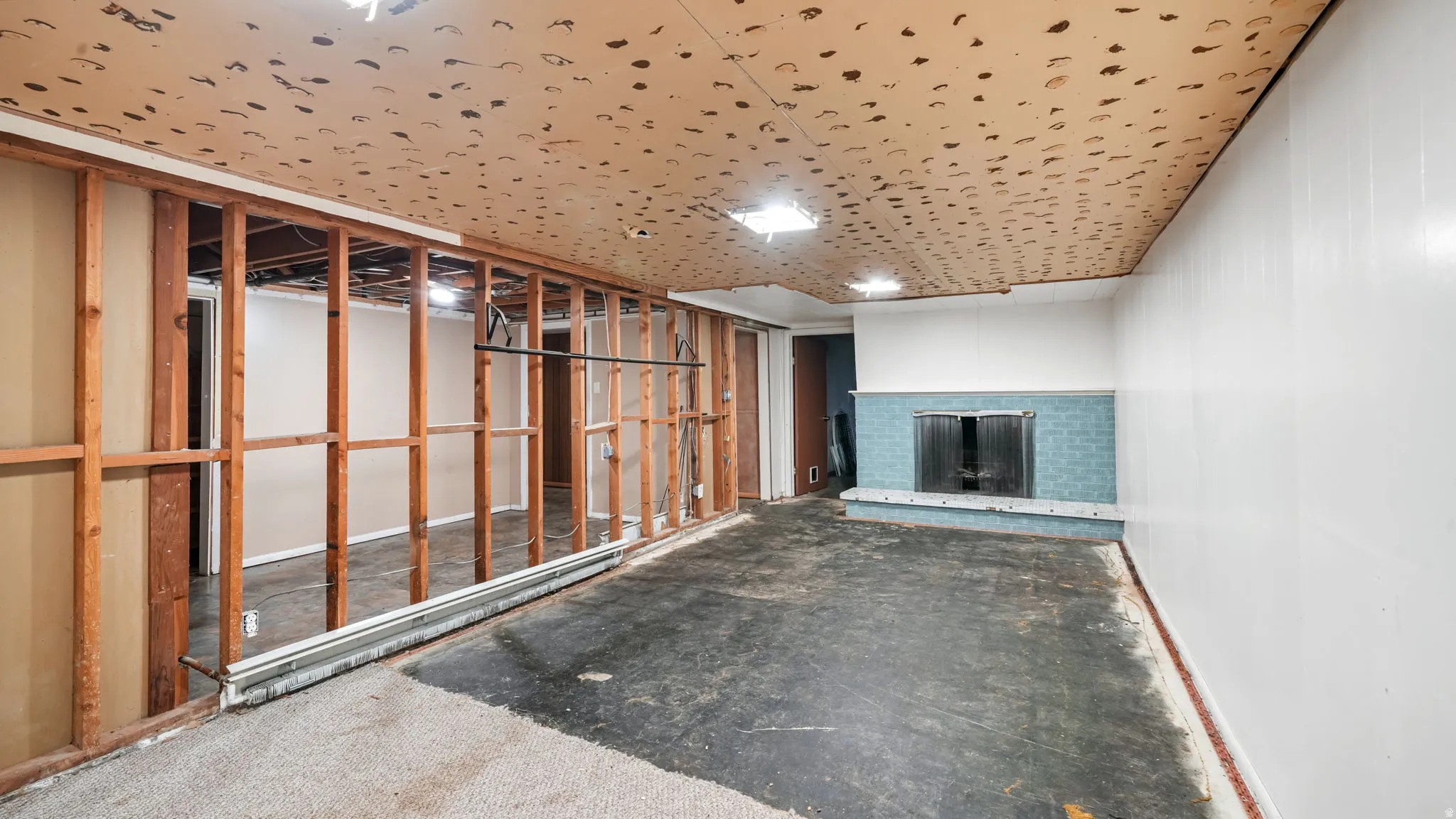 Finished below grade area with a fireplace