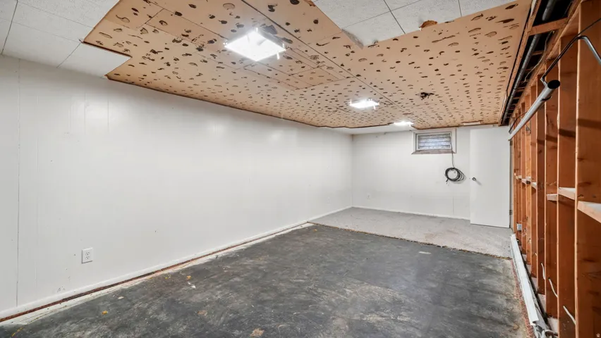 Finished basement with baseboards