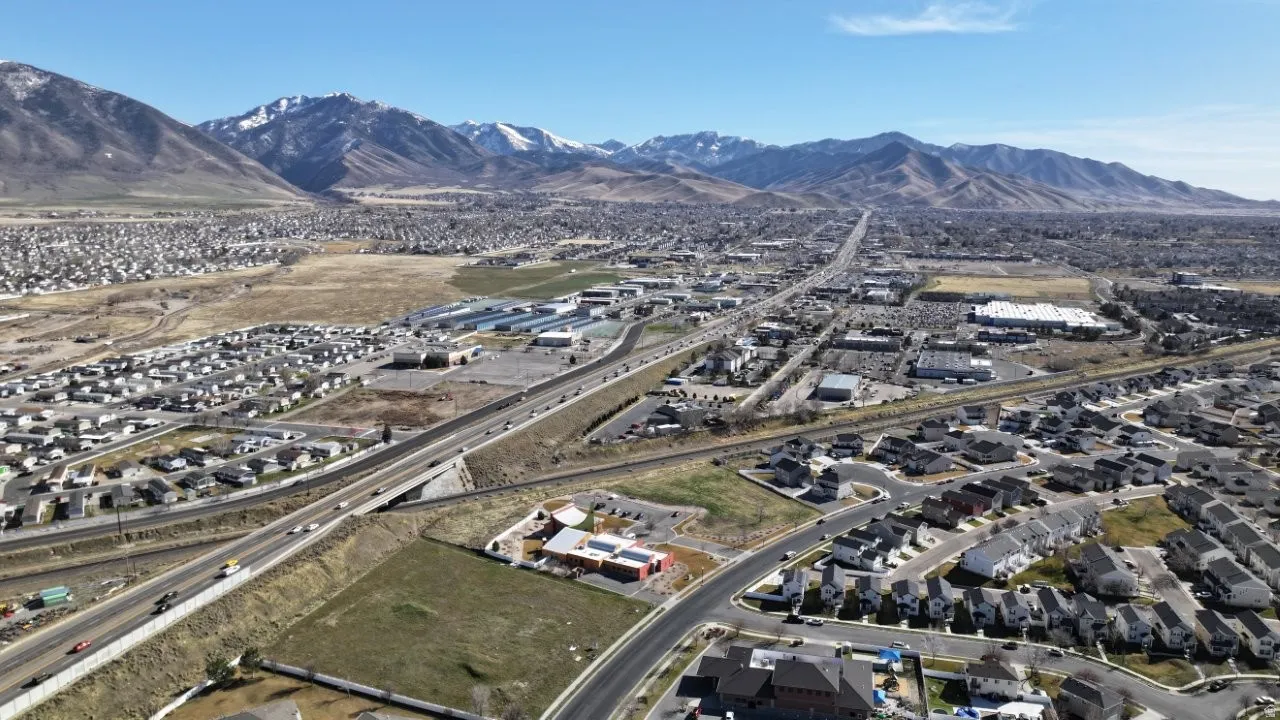 Aerial view of residential area with mountains