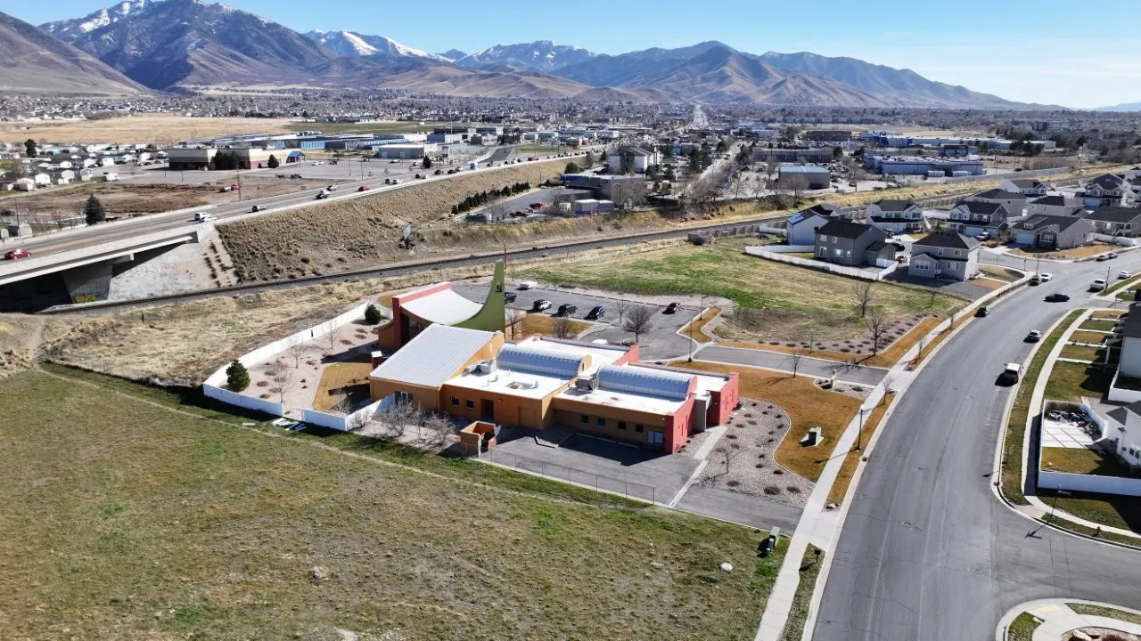 Aerial view of residential area featuring mountains