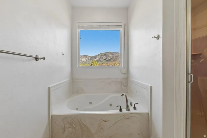 Full bath with a whirlpool tub