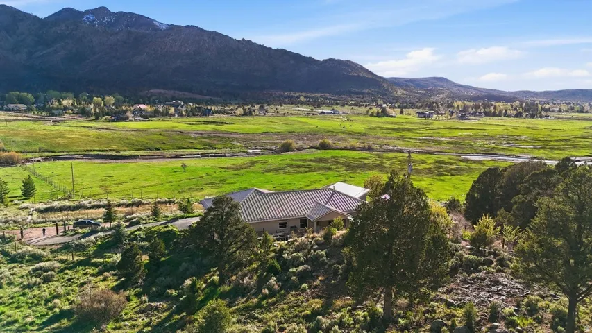 View of mountain background featuring rural landscape and a pastoral area