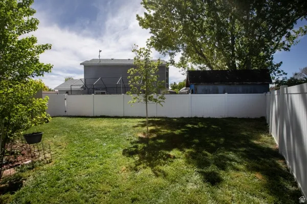 View of fenced backyard