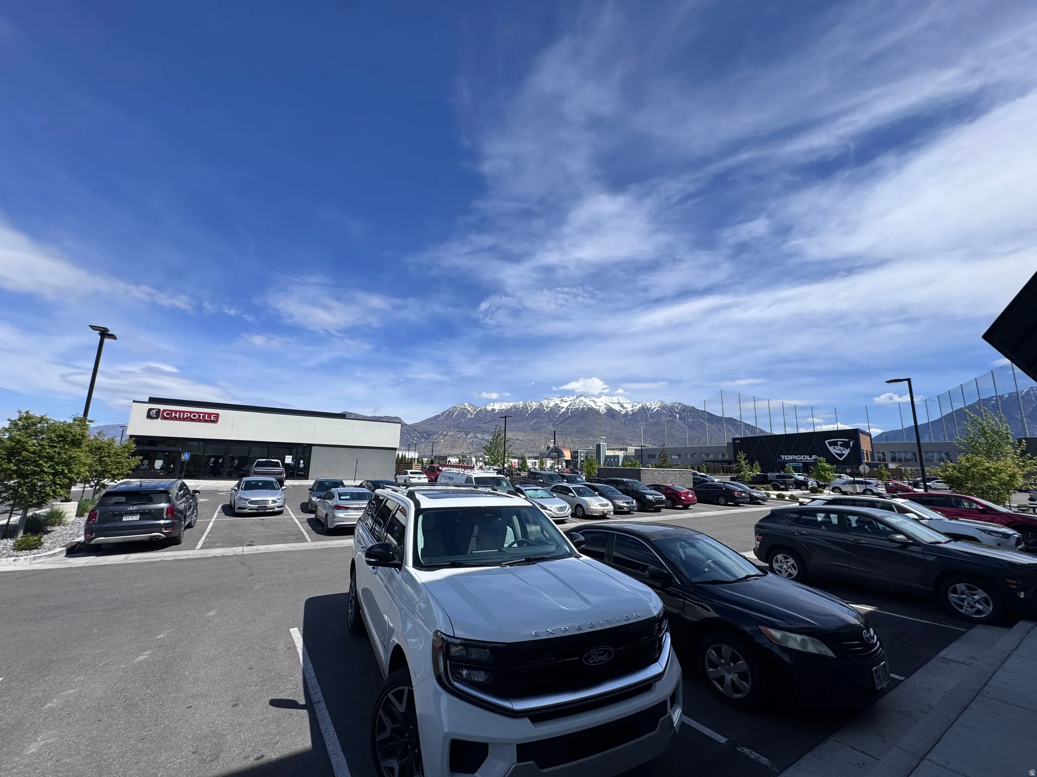 Uncovered parking lot with a mountain view