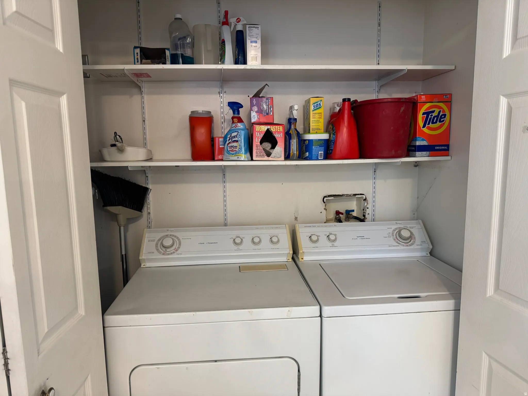 Laundry area with separate washer and dryer