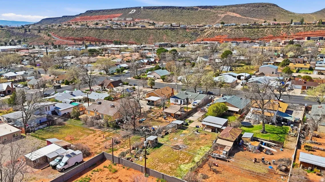 Aerial view of residential area featuring mountains