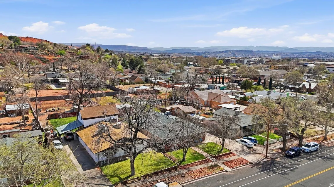 Aerial view of residential area with mountains