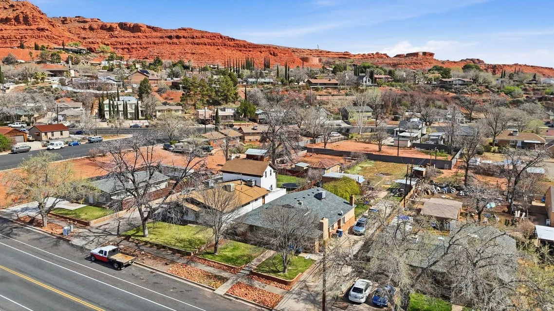 Aerial view of residential area with a mountainous background
