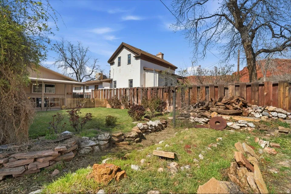 View of fenced backyard