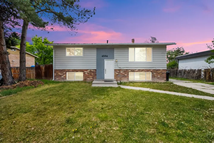 Split foyer home with brick siding