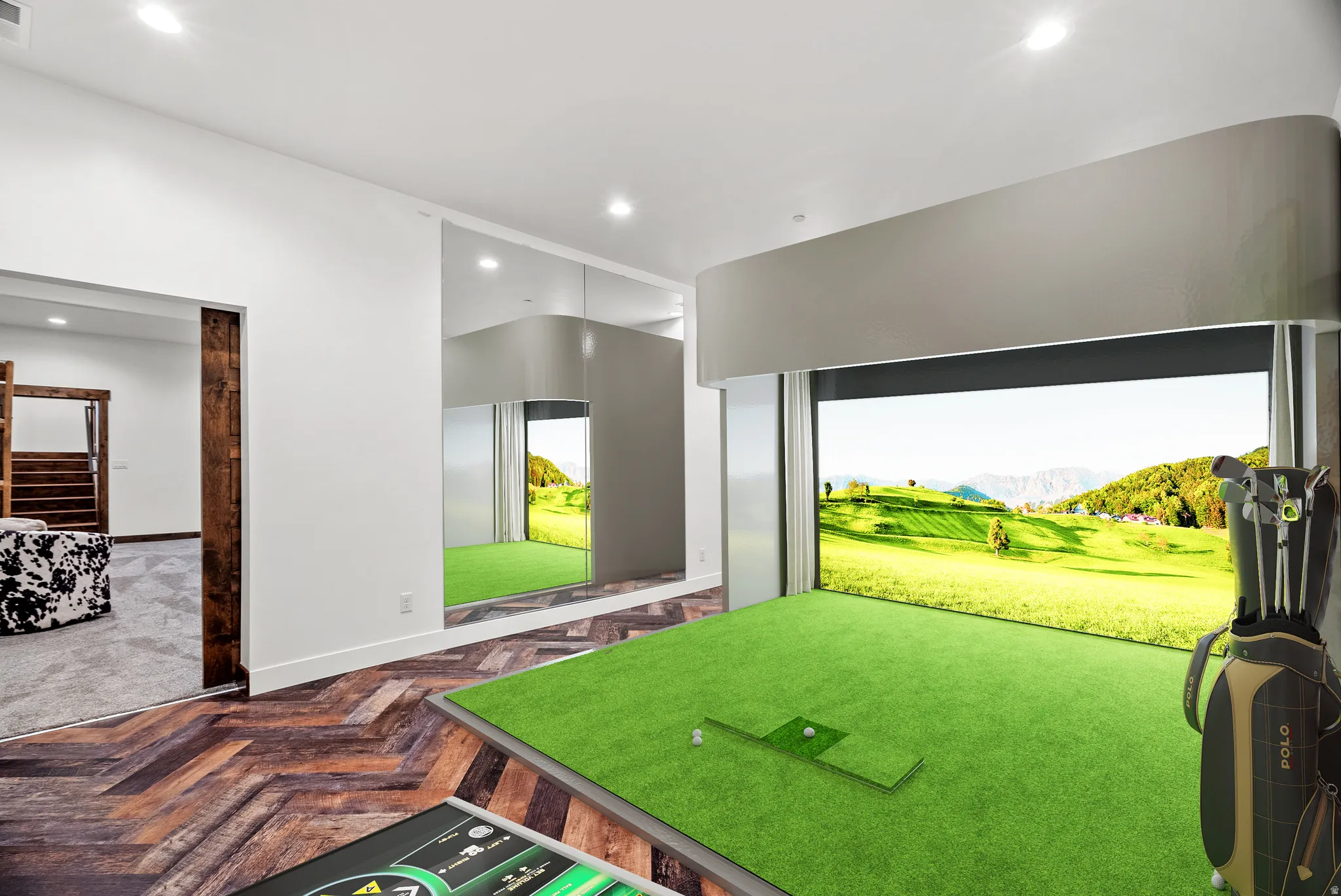 Rec room featuring a mountain view, golf simulator, recessed lighting, and parquet flooring