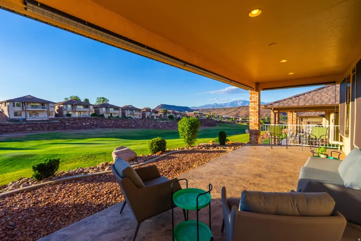 View of patio with outdoor lounge area and golf course view
