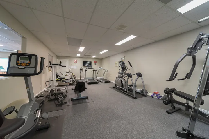 Gym featuring a drop ceiling