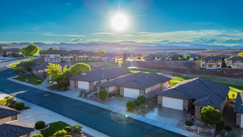 Aerial view of residential area with a mountainous background