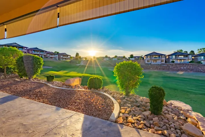View of green lawn featuring a residential view