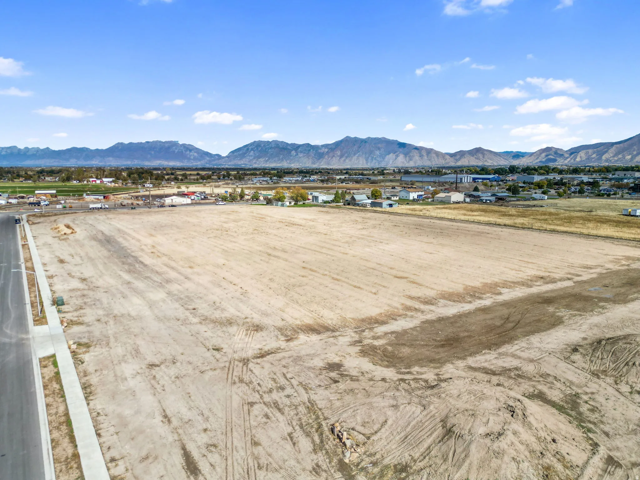 Mountain view featuring nearby suburban area