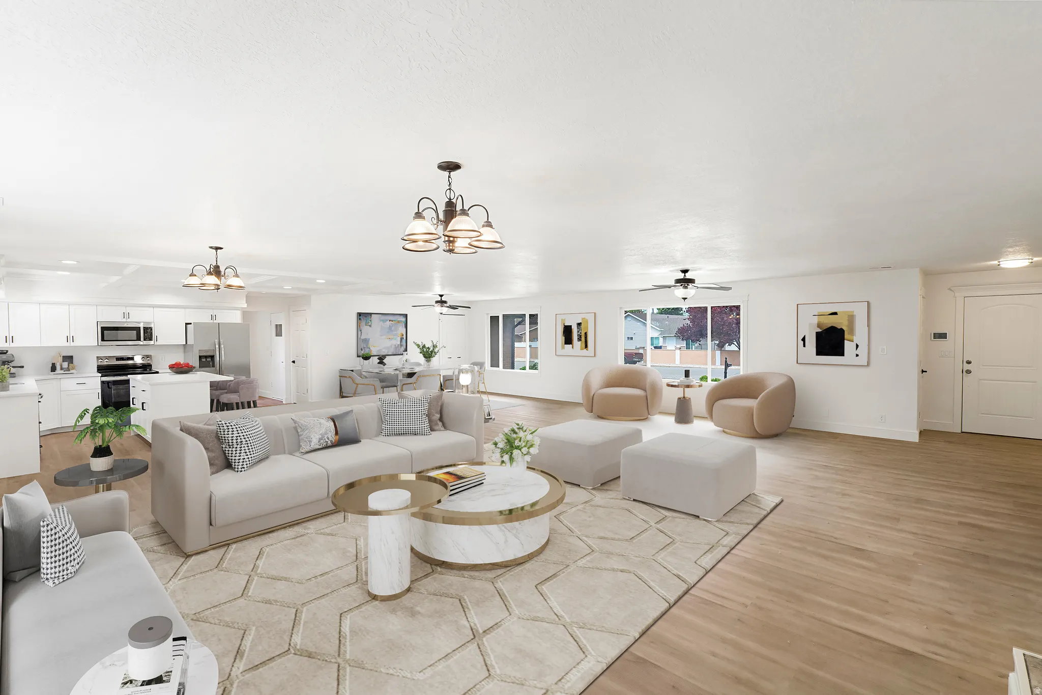 Living area featuring a ceiling fan, a chandelier, and light wood-style flooring