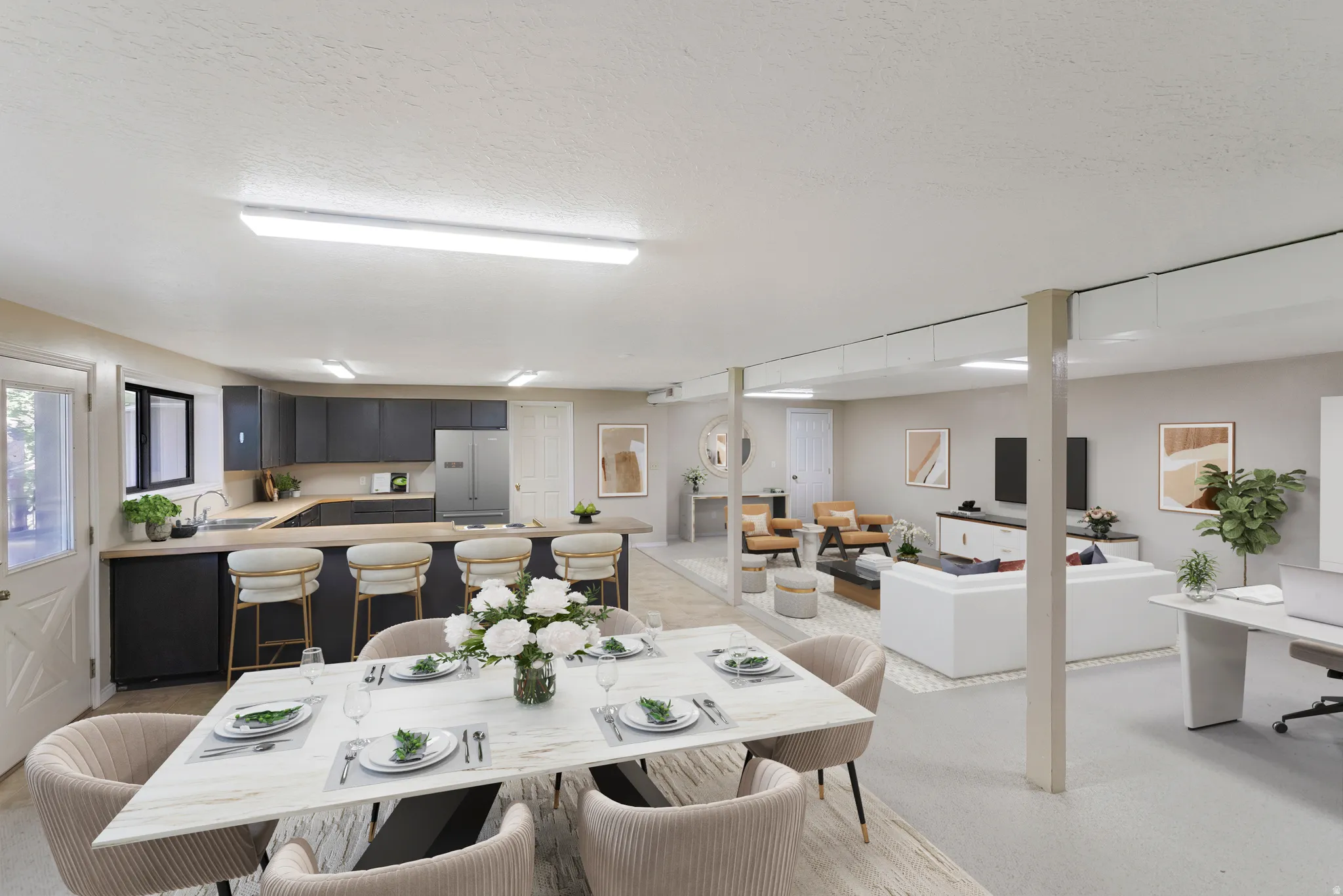 Dining room with a textured ceiling and light carpet