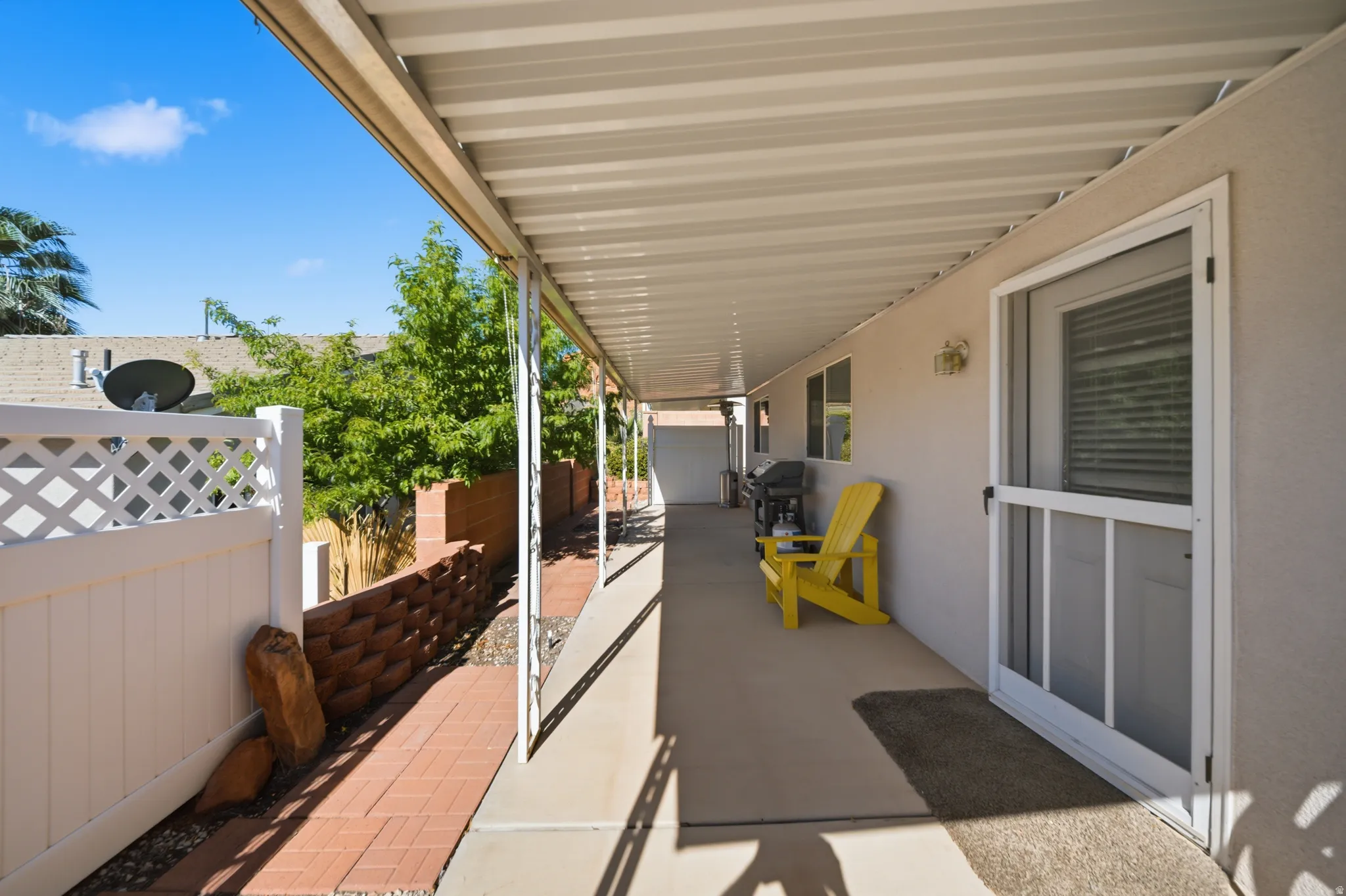 View of patio featuring area for grilling