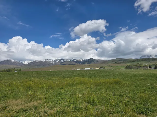 View of mountain background with rural landscape and a pastoral area