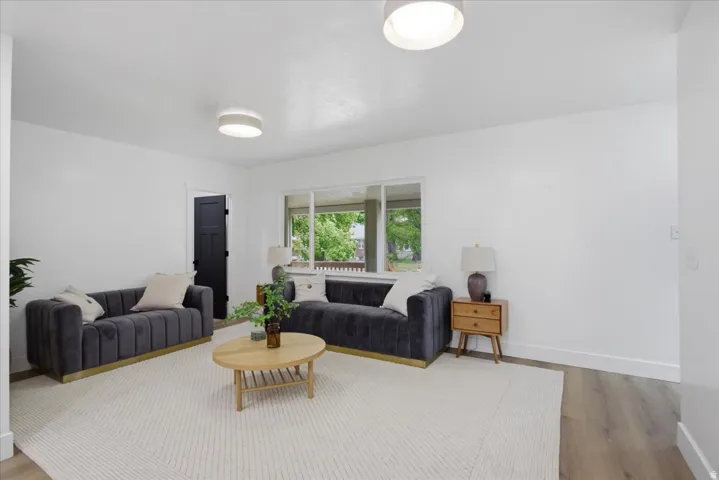 Living area with wood finished floors
