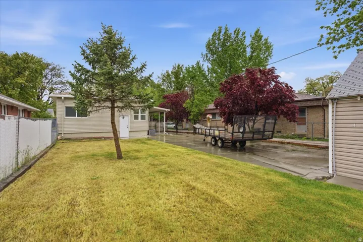 Fenced yard with a patio