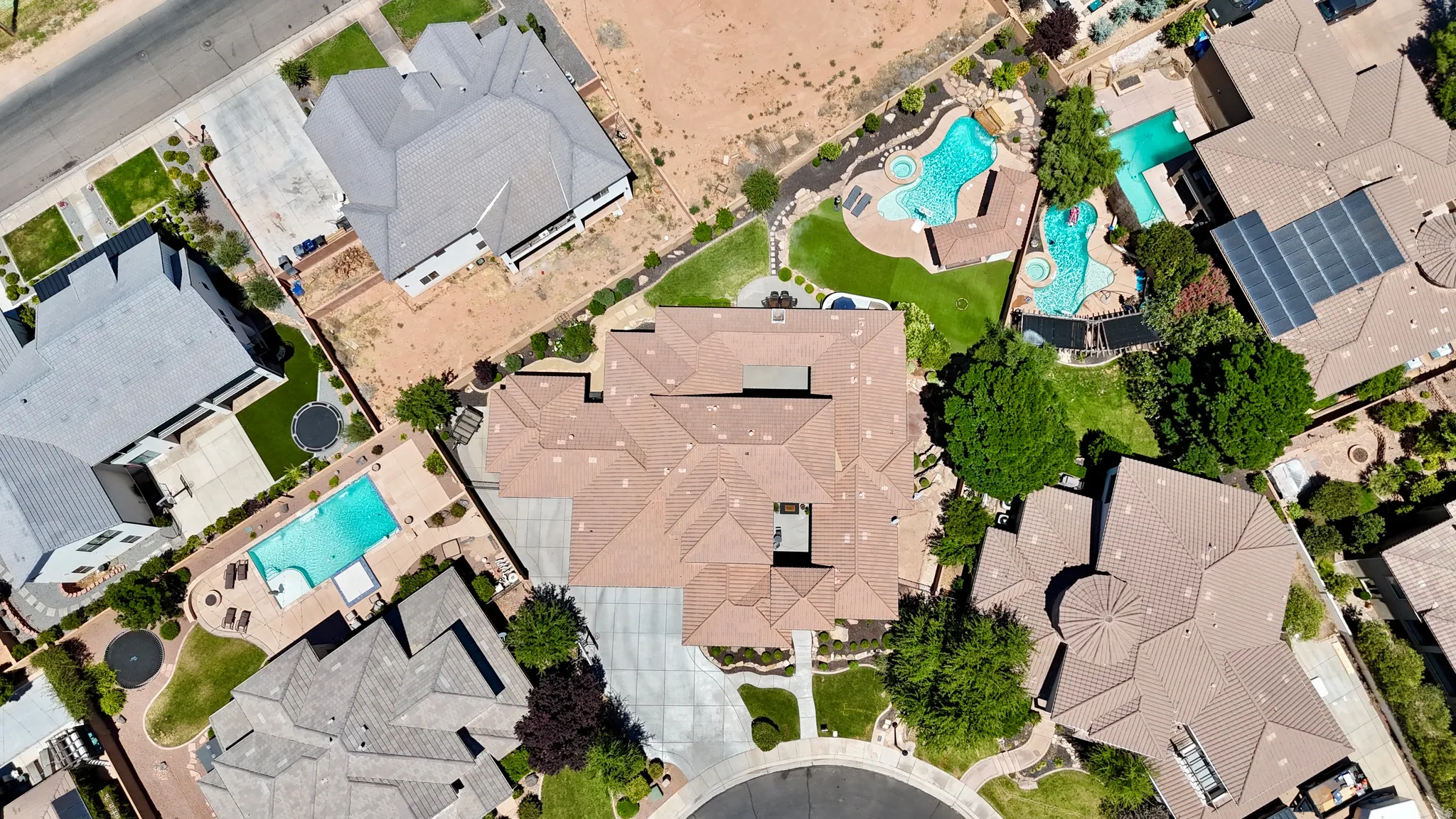Expansive property featuring a large residence with a multi-level roofline