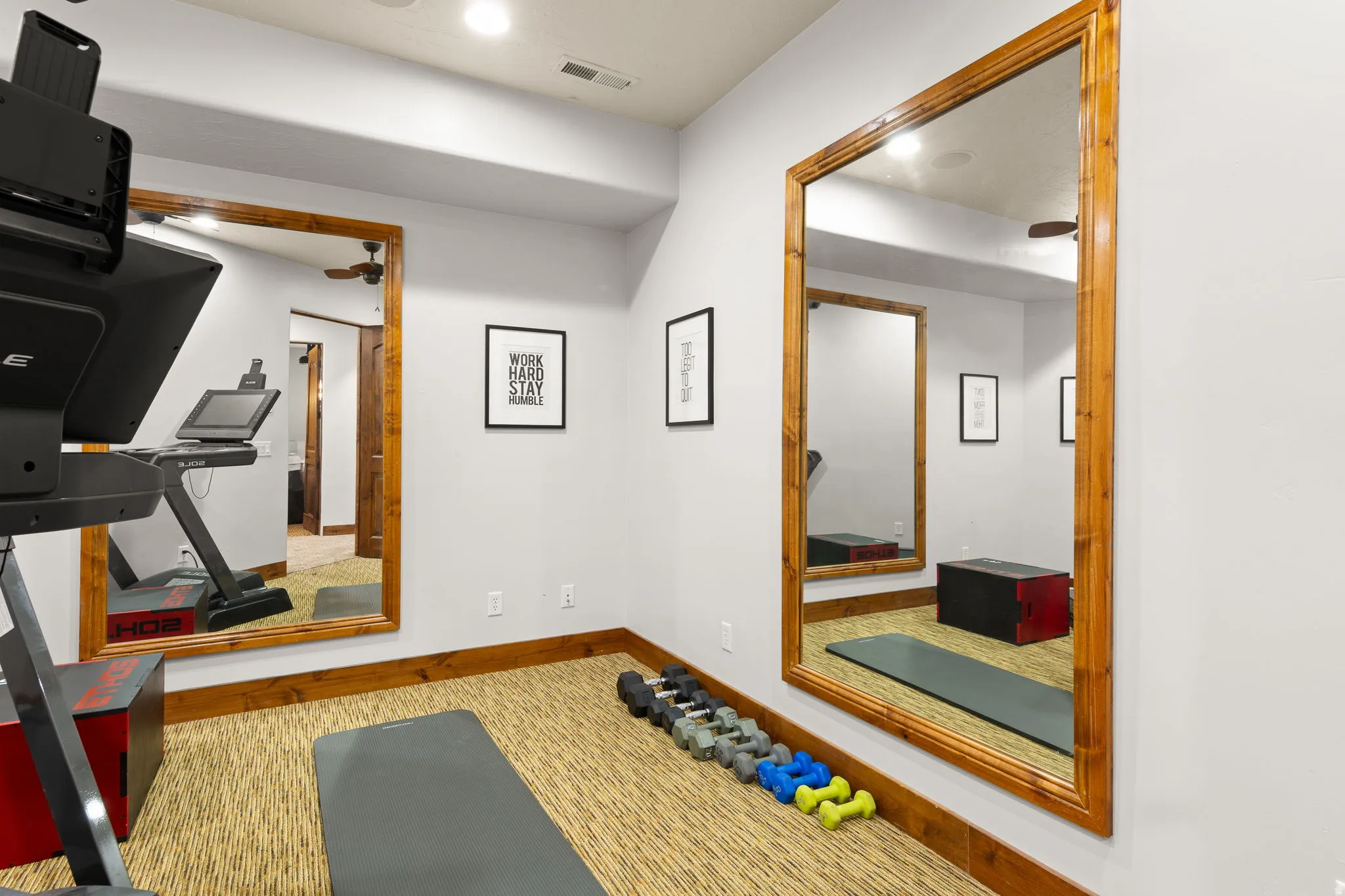 Exercise room featuring baseboards