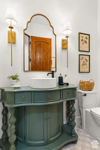 Bathroom featuring toilet and vanity