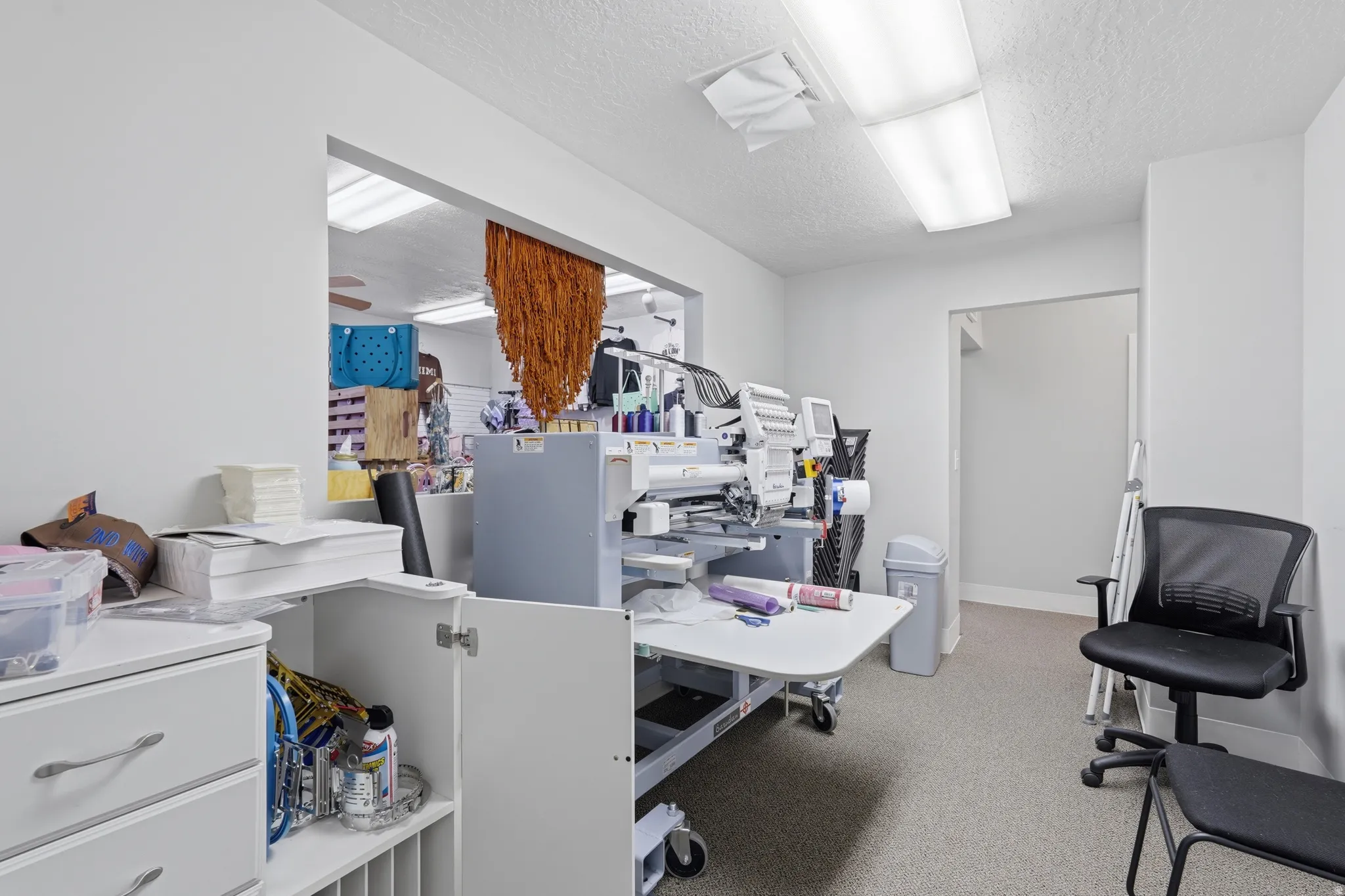 Office featuring a textured ceiling