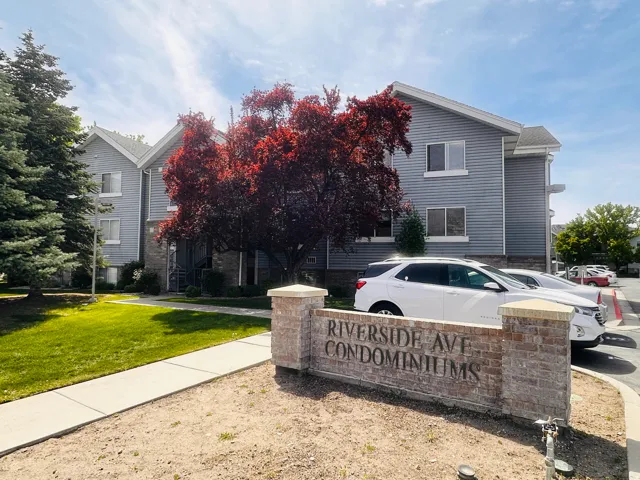 View of front of building featuring a front yard