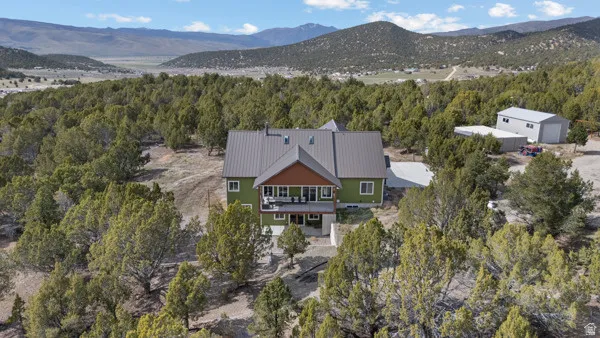 View from above of property with a mountainous background