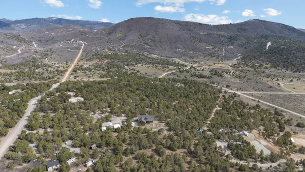Drone / aerial view of a mountain backdrop