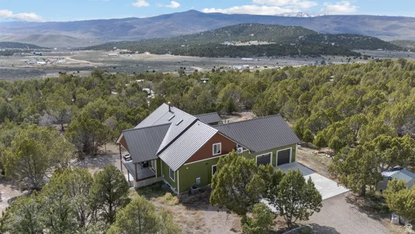 View of subject property with mountains