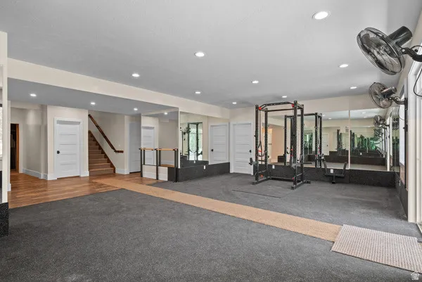 Exercise room featuring recessed lighting