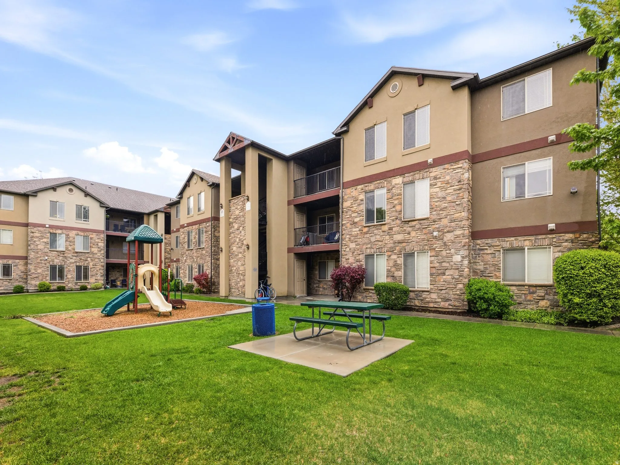 View of building. Condo located on 3rd floor right.