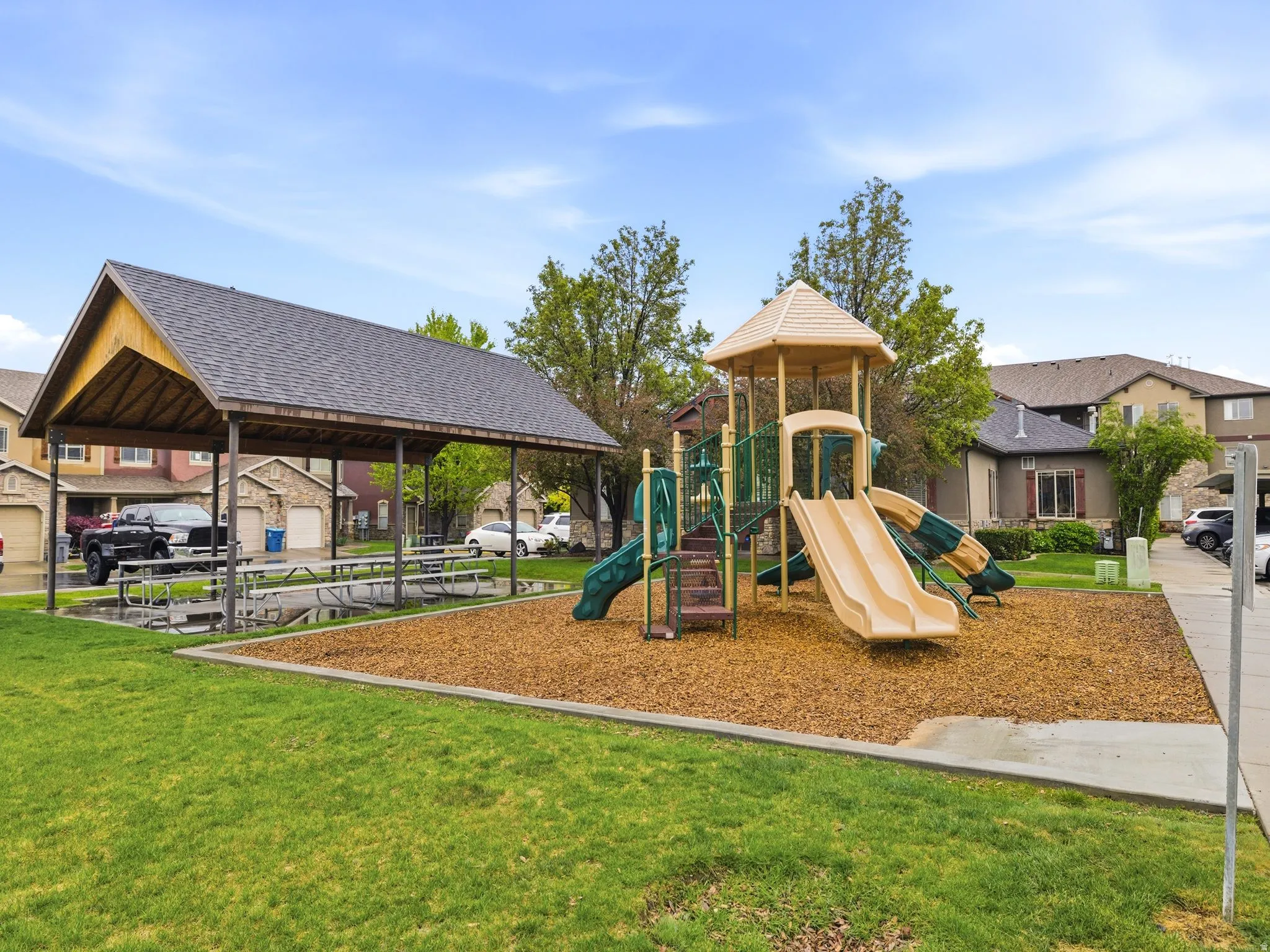Communal playground featuring a yard