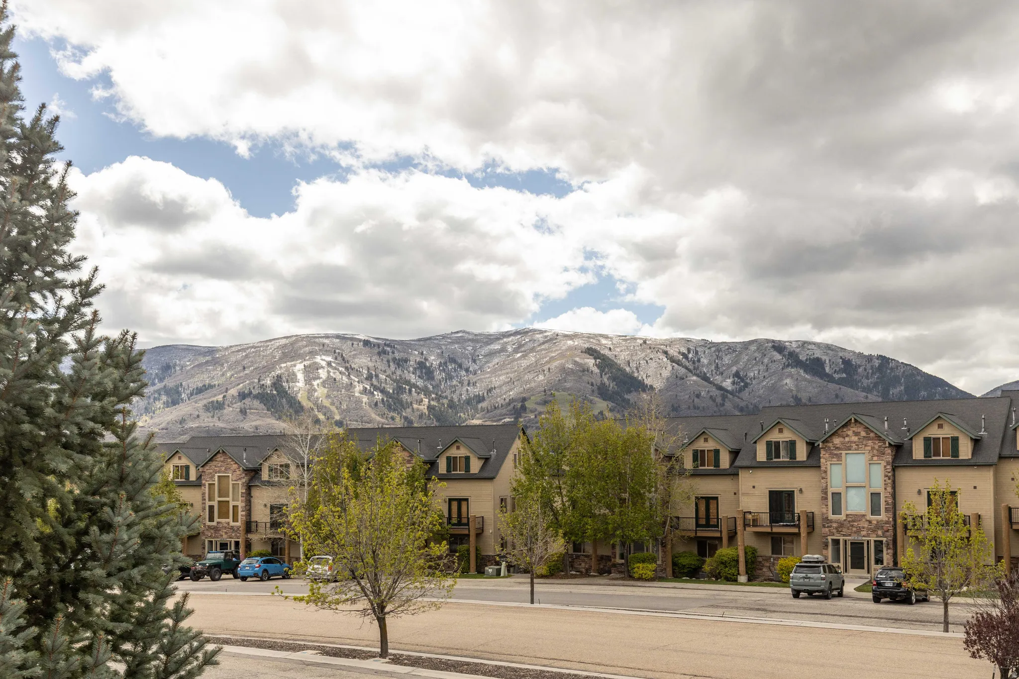 View of mountain backdrop with nearby suburban area
