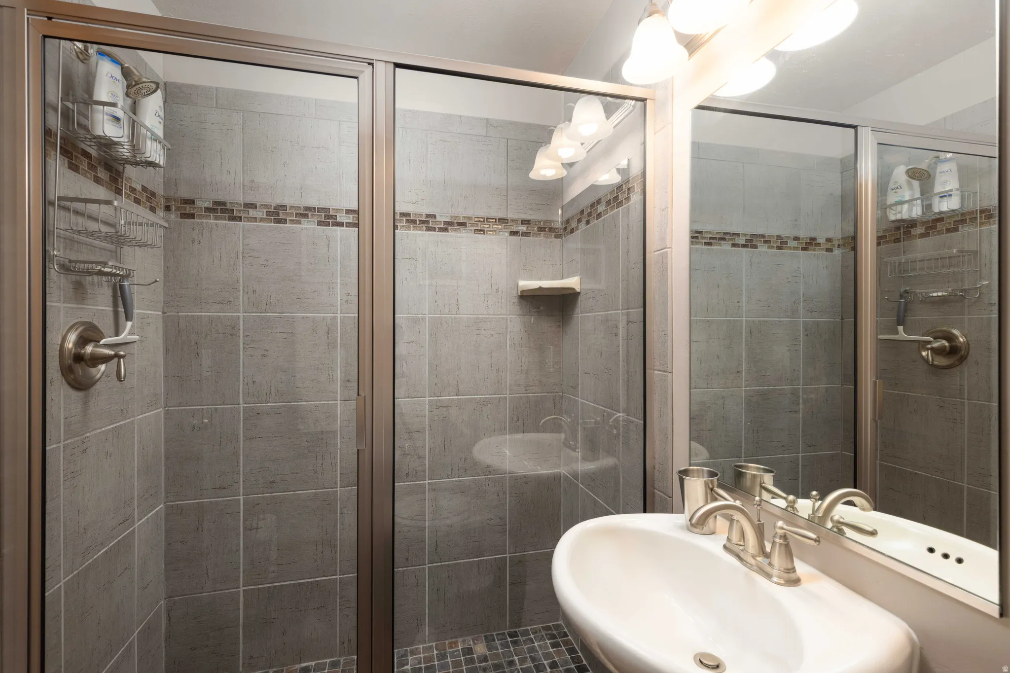Full bath with a shower stall