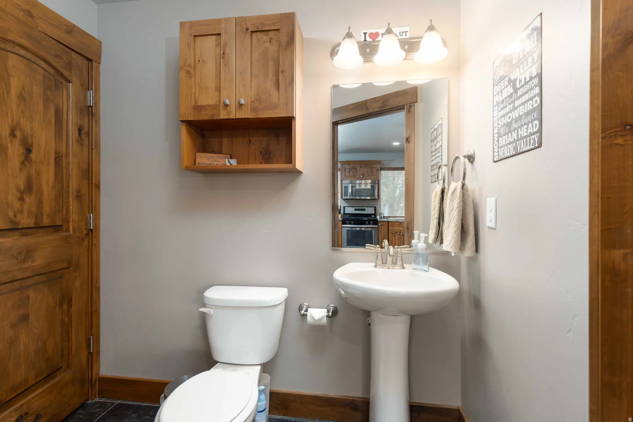 Bathroom featuring toilet and baseboards