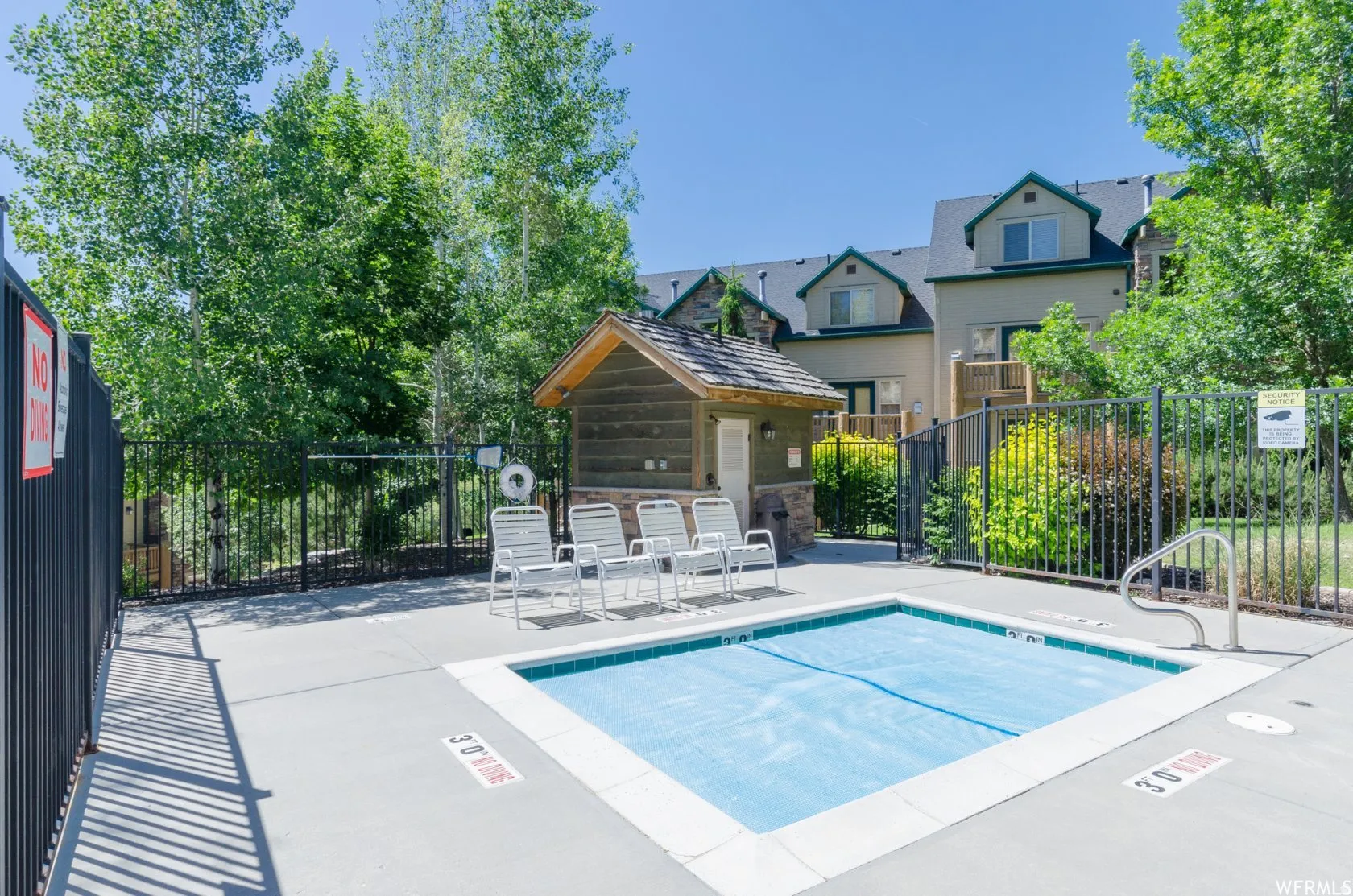 View of swimming pool featuring a pool