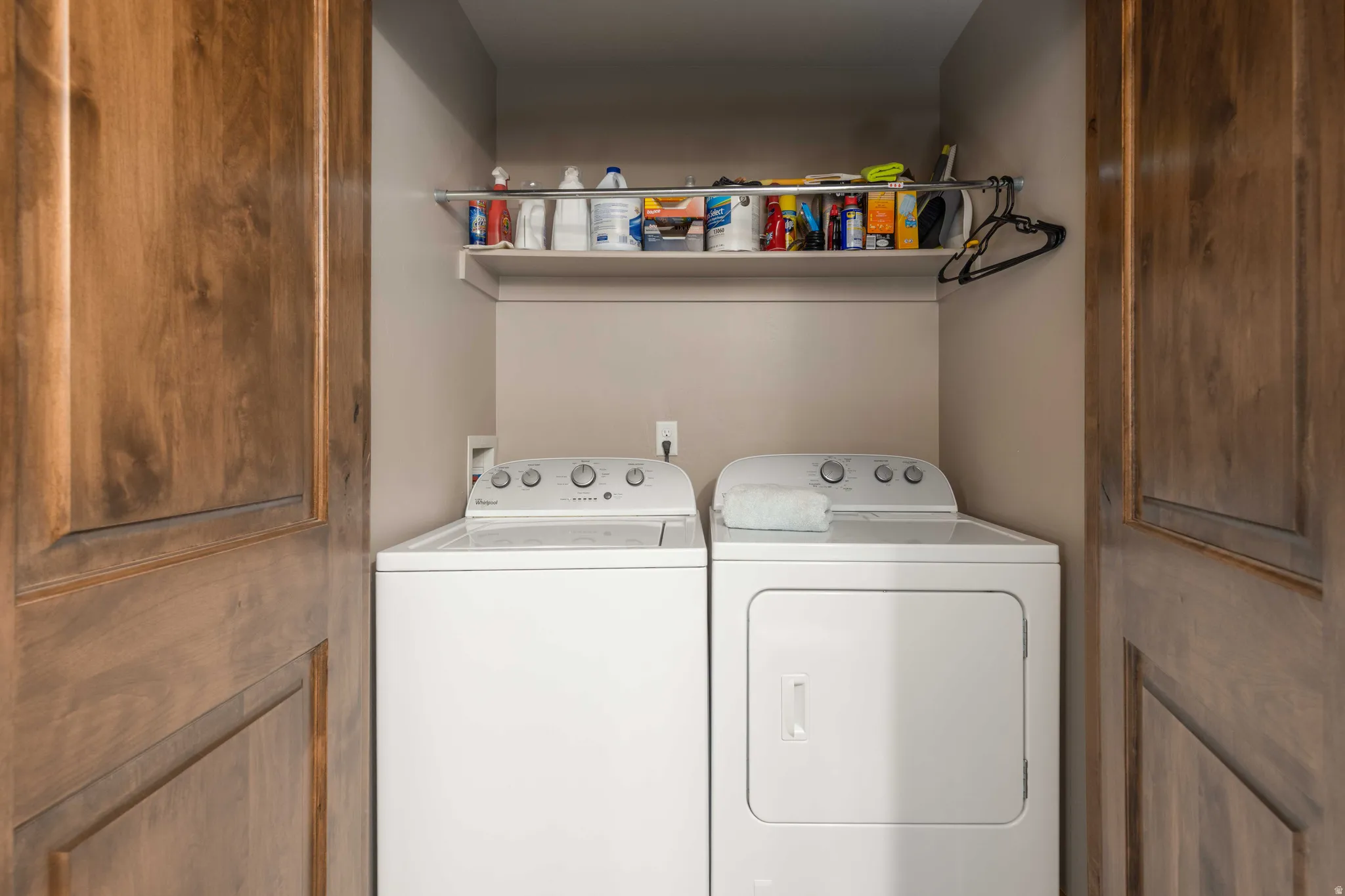 Laundry area featuring separate washer and dryer