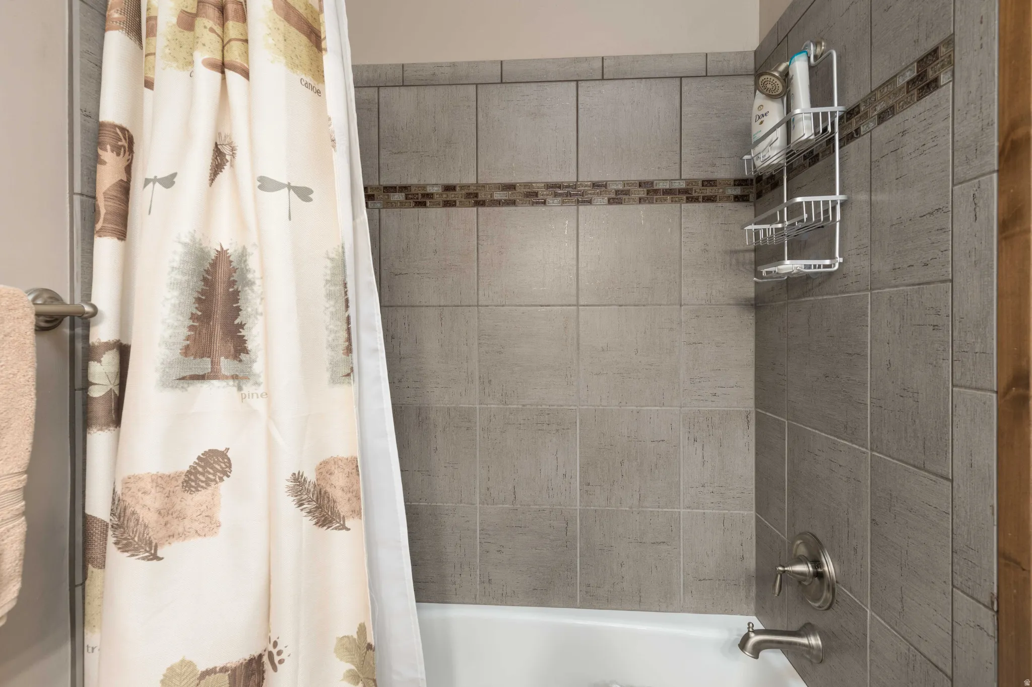 Bathroom featuring shower / tub combo