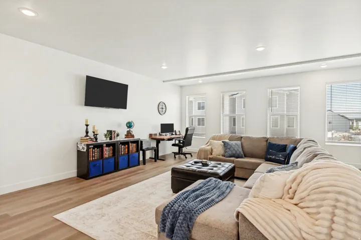 Living room with beautiful windows.
