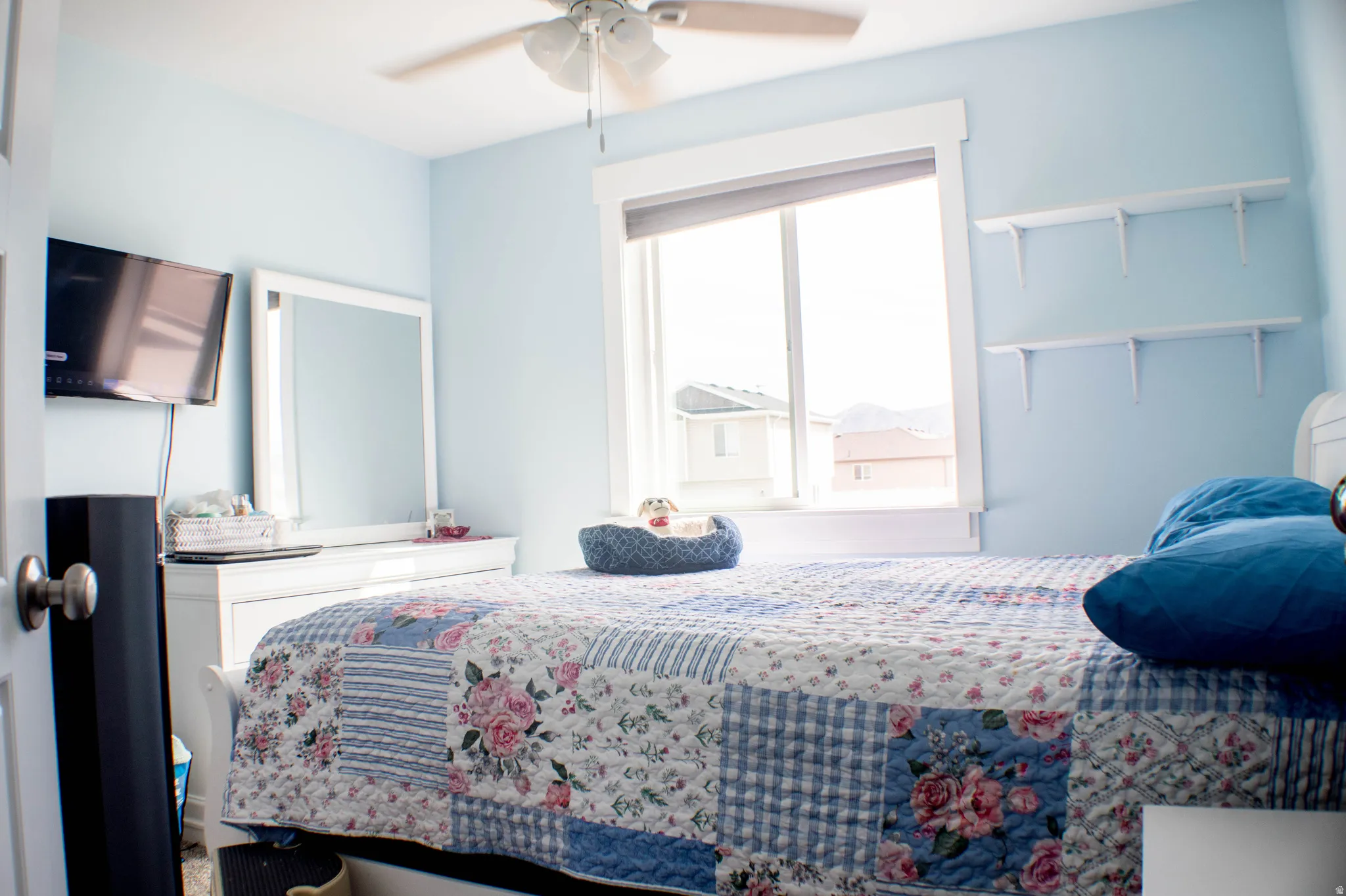 Bedroom featuring a ceiling fan