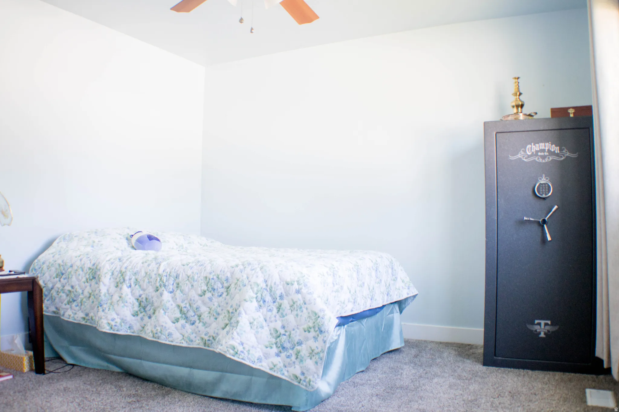 Neutral-toned wall paint and grey carpeting define this interior space