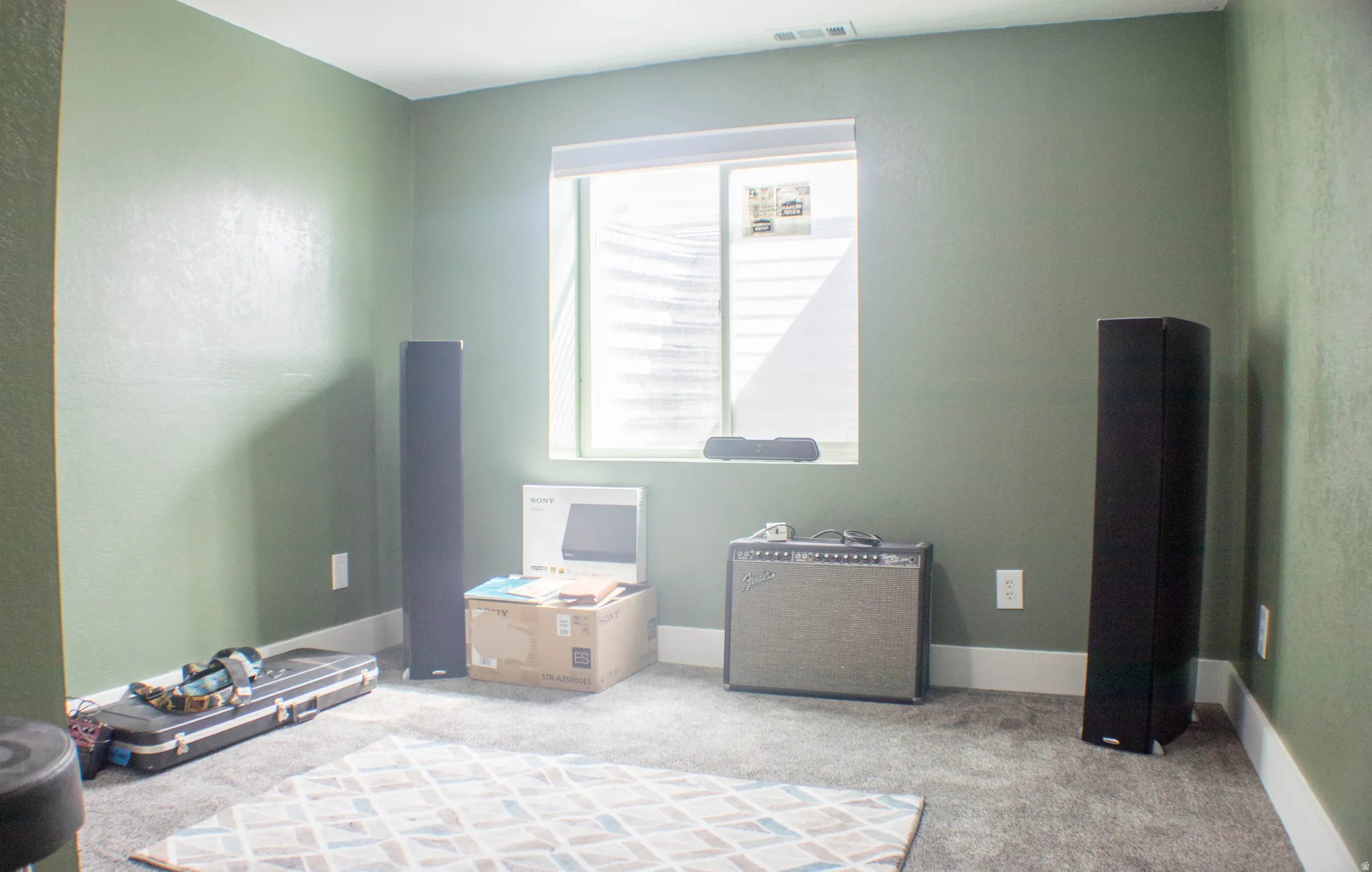 Bedroom with light carpet