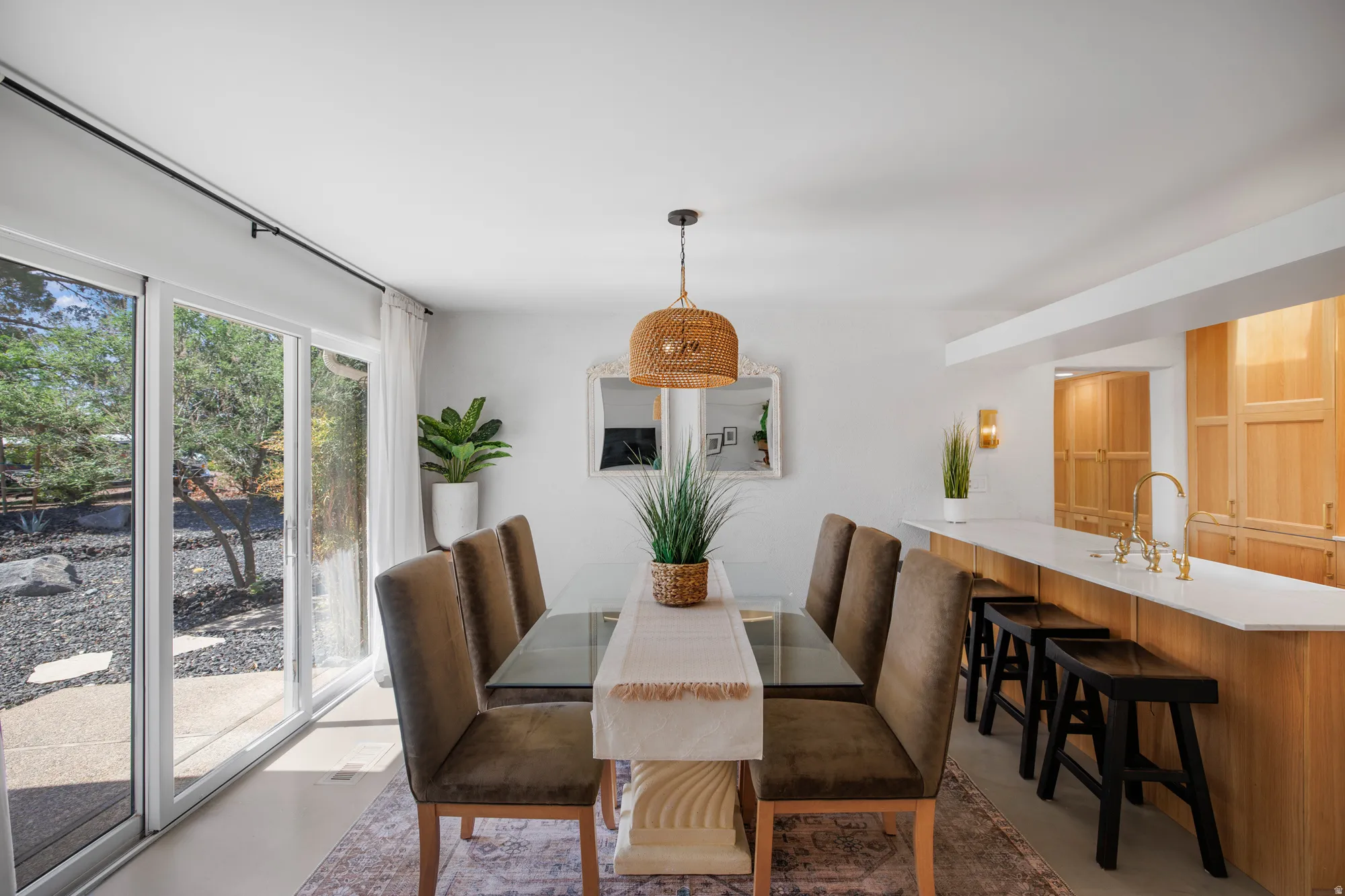 Dining area featuring concrete flooring