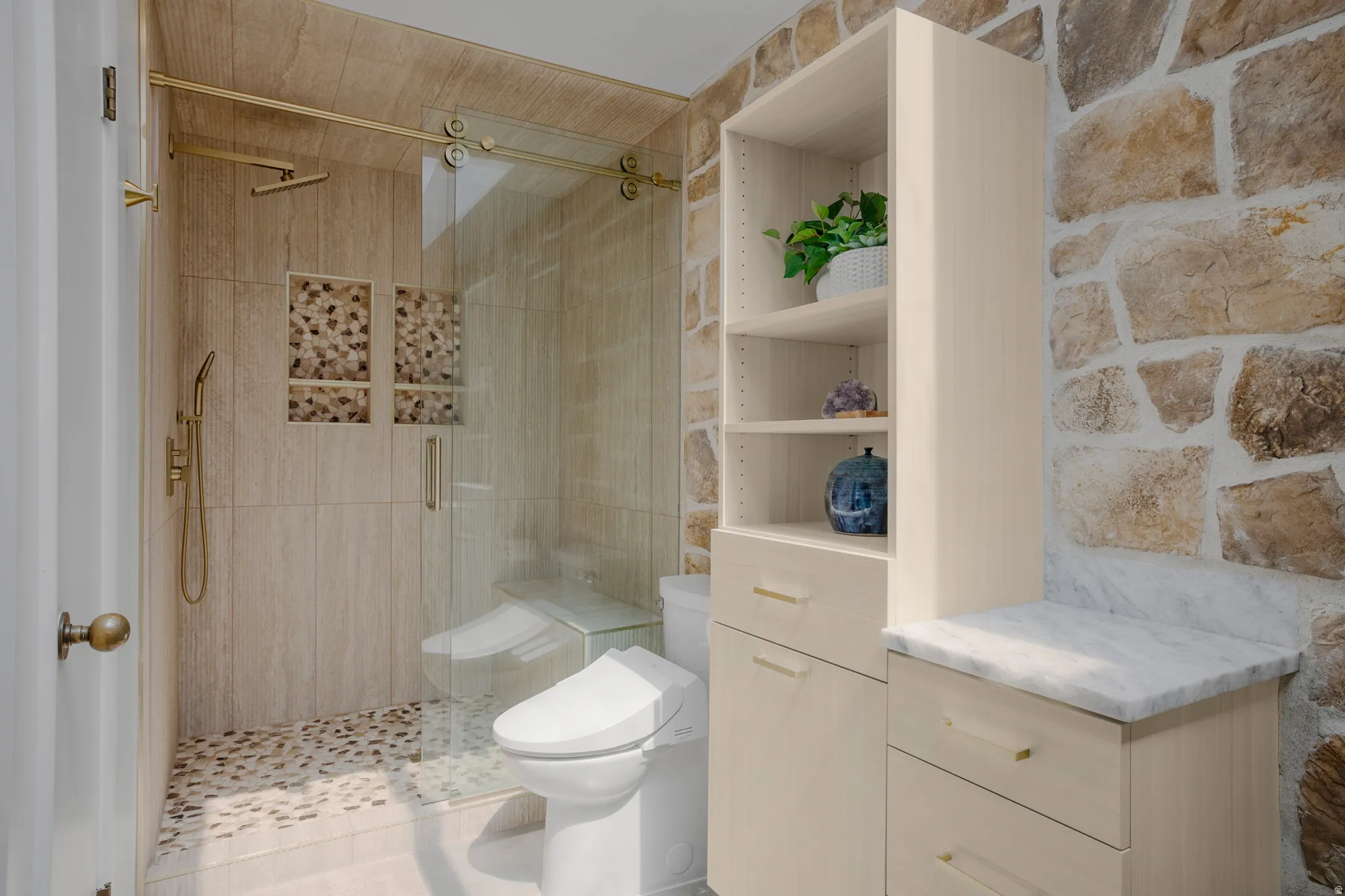 Full bathroom featuring toilet and a stall shower