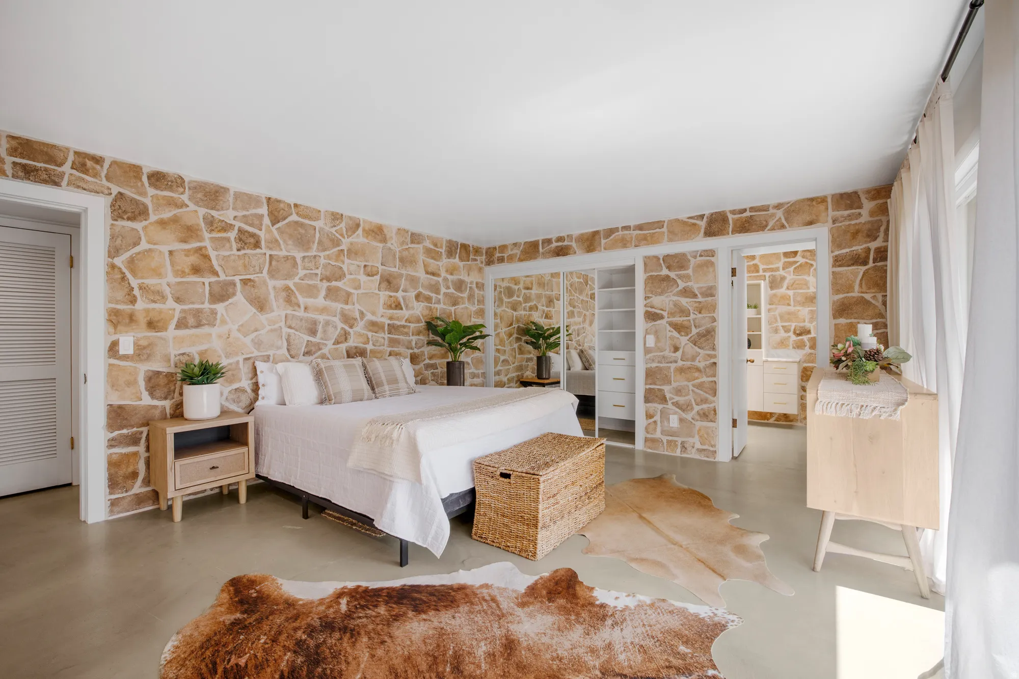 Bedroom with finished concrete flooring